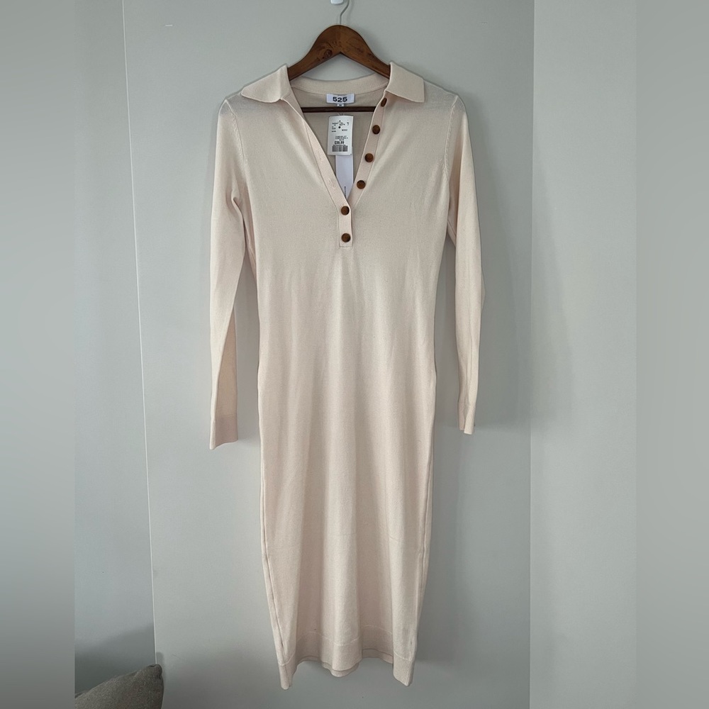 Sweater dress! Looks great on. Never worn.